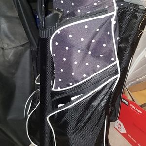 Golf bag with wheels.